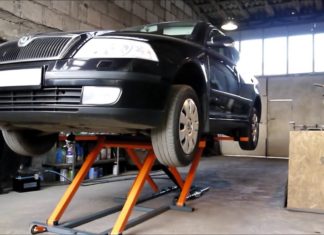 Автомобильный подъемник многофункционального типа