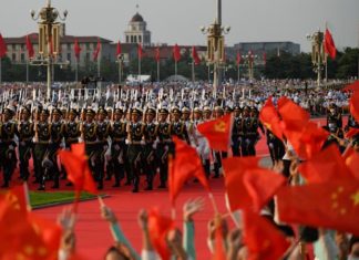 Администрация Байдена обвиняет Китай в массовых закерских атаках